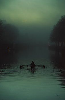 Rowing on the Merwedekanaal at the Muntsluis in Utrecht