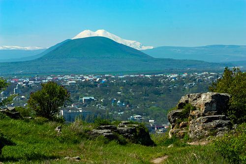 View the snowy peaks of Elbrus.