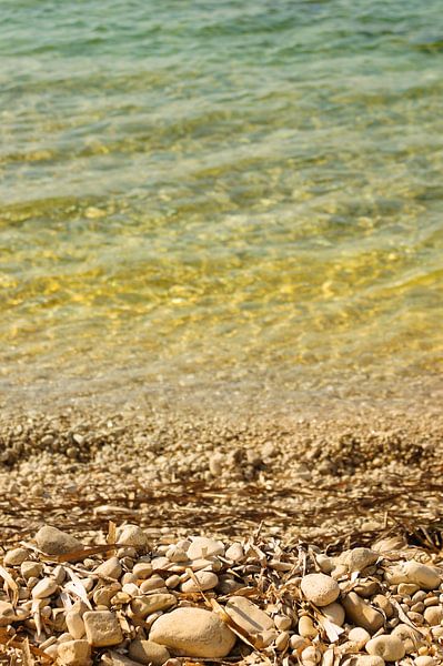 Pebbles on the beach by Jadzia Klimkiewicz