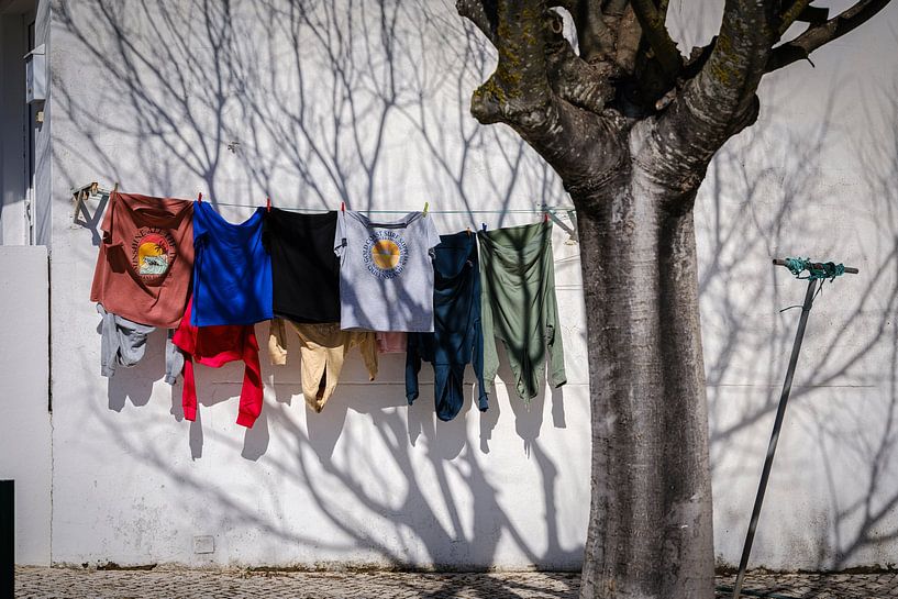Clothes hang out to dry on the clothesline by Eddy Westdijk