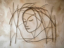 A meditative wabi-sabi portrait made from twigs: organic wall art on lime plaster