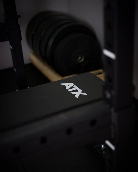 Fitness bench in a gym by Karlijn Verkaik