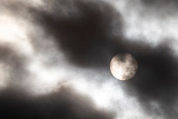Sun behind clouds