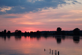 Sonnenuntergang an der Mauer von Iris Lobregt