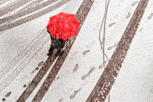 Roter Regenschirm im Schnee