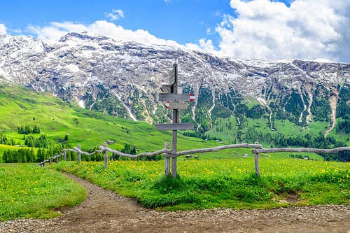 Hiking directions sign on the Seiser Alm or Alpe di Siusi 