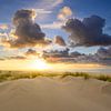 Sunset at the beach of Texel with sand dunes in the foreground by Sjoerd van der Wal