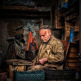 Man at work by Anajat Raissi