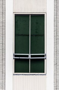 The window offers no view inside.