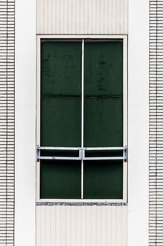 The window offers no view inside.