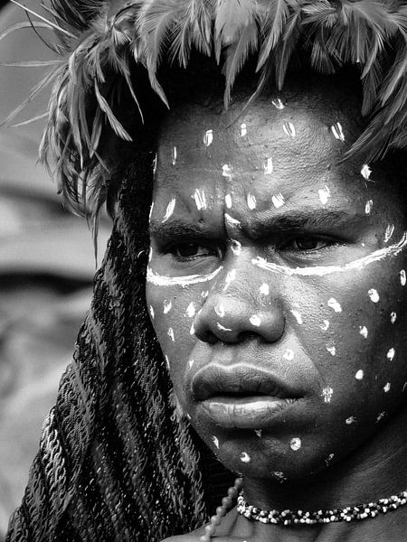 Festive tribal face decoration of a woman van Global Heartbeats