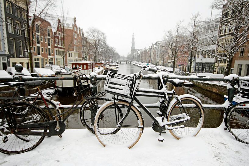 Snowy Amsterdam in winter with the Westerkerk by Eye on You
