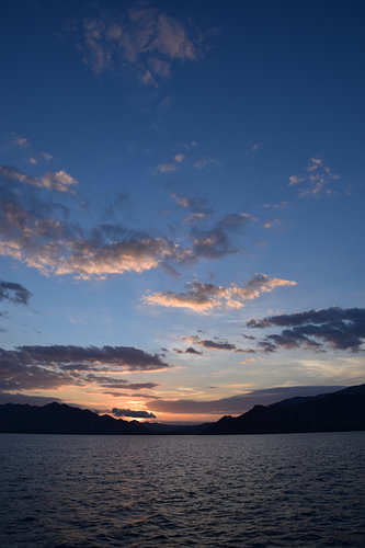 A sky with clouds bathed in light