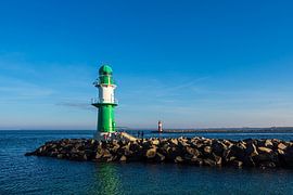 Pier and pier tower on the coast of the Baltic Sea in Warnemünde by Rico Ködder
