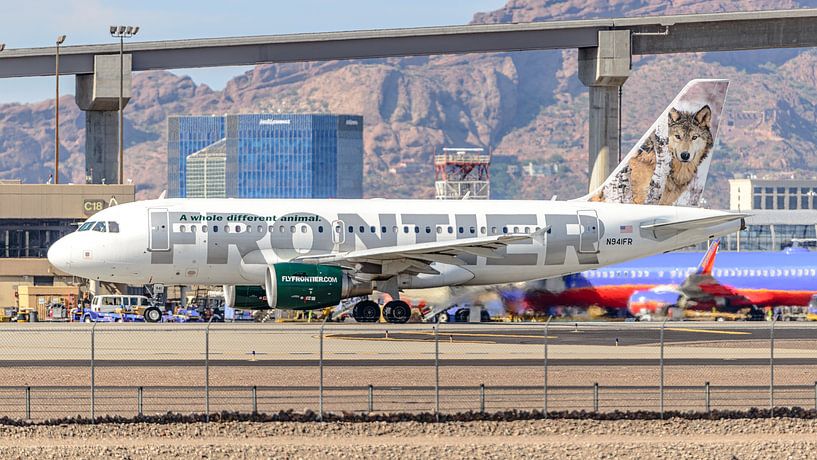 Frontier Airlines Airbus A319-100. by Jaap van den Berg