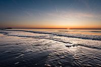 Zonsondergang bij Sankt Peter-Ording aan de Noordzee