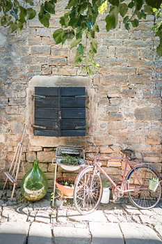 Old bicycle and stone wall, Mediterranean charm in detail