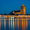 De kerk van Dordrecht in het blauwe uur. van Jos Pannekoek