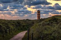 Lighthouse Dishoek under colorful clouds by R Smallenbroek thumbnail