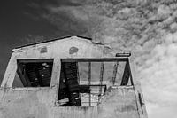 Black and white photo of an old dilapidated building/ ruin