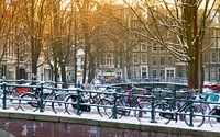 Cycling on the bridge in Amsterdam