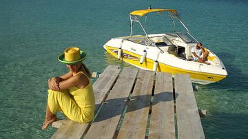 Blonde woman alone on a jetty