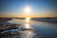 Strand bij zonsopgang