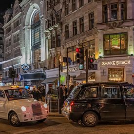 Taxis in London von Wim Kanis