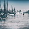 Ice floor in the harbour by Jan van der Knaap