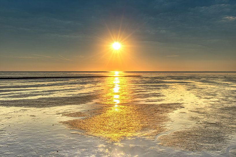 Sunset over the Wadden Sea near Koehoal in Friesland by Harrie Muis