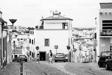 Mother calling daughter in Lagos, Portugal.
