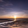 Zonsondergang aan het strand in Zeeland van Judith Borremans