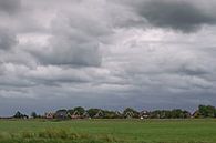 Dark sky over the village by MMFoto thumbnail