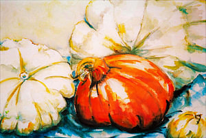 Orangefarbene und weiße Kürbisse.