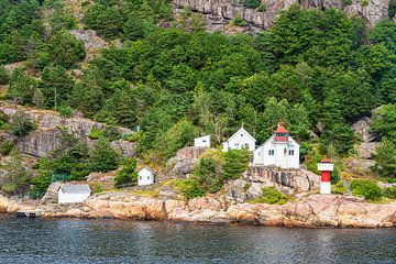 The lighthouse Odderøya Fyr in Norway by Rico Ködder