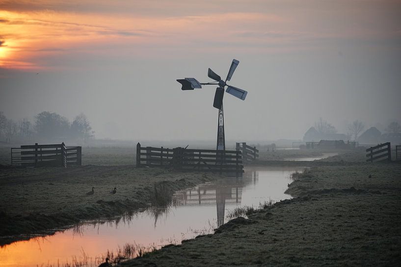 Sunrise above the Schermer by Evert Middelbeek