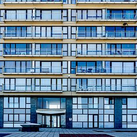 Apartment building with a rhythm of glasswork in Ostend Belgium by george vogelaar