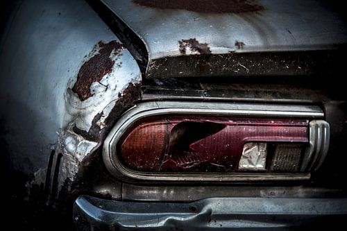 An abandoned rusted old-timer Datsun 120y