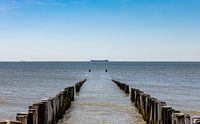 Beach posts with a ship