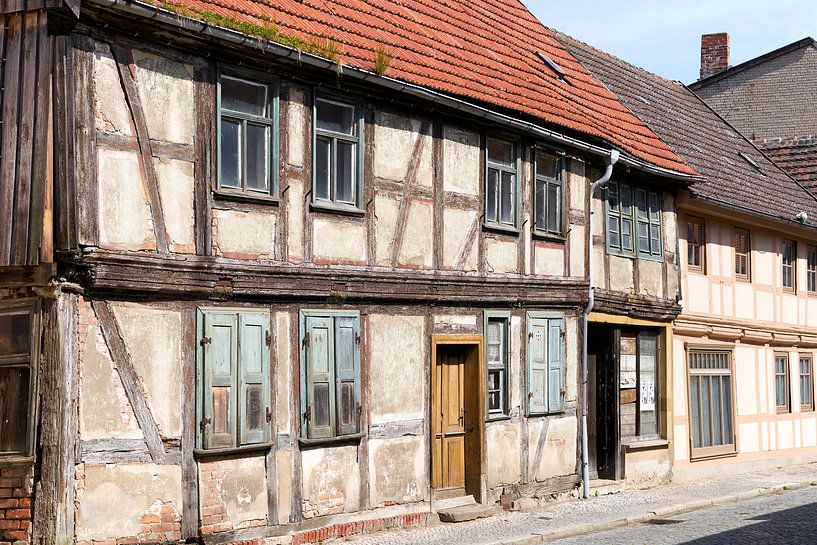 dilapidated half-timbered houses in the old town of Tangermünde by Heiko Kueverling