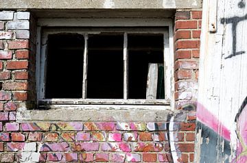 photo of a colorful window in poor condition