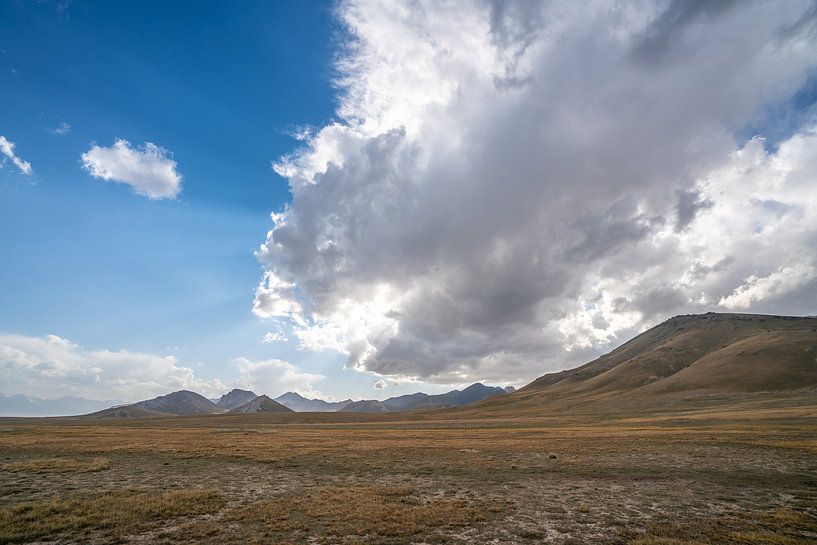 Rolling clouds in Kyrgyzstan by Mickéle Godderis