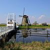 Bridge crossing to the Nederwaard museum mill by Frank's Awesome Travels