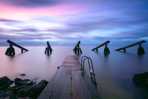 Ijsbrekers Marken onder een kleurige zonsopkomst