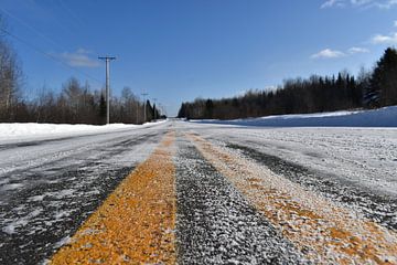 A country road in winter by Claude Laprise