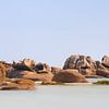 Rocks in the Sea at the Pink Granite Coast in France II by Claire van Dun