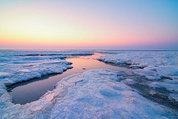 Arctic ice and sea landscape on the sand flats in the Waddensea 