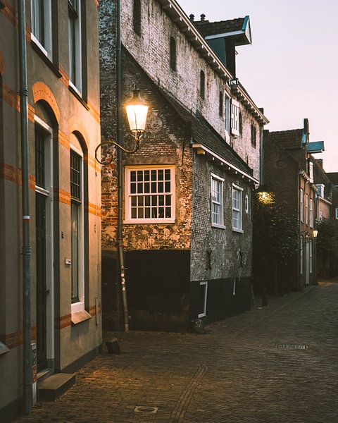 Lantern pole in a typical street of the Muurhuizen in Amersfoort by Michiel Dros