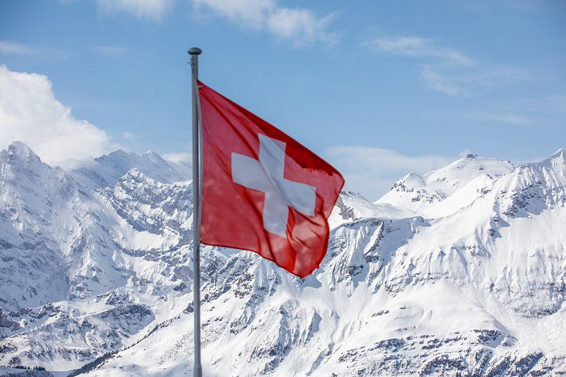 Swiss flag in front of an Alpine panorama by t.ART