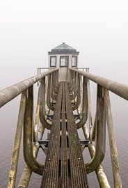 Oostmahorn lighthouse in the fog by Martin van Kammen